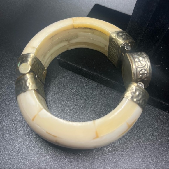 Vintage Water Buffalo Bone
Turquoise Gemstone Silver Tone
Hinged Bracelet - Picture 2 of 9